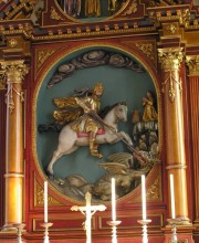 Médaillon du maître-autel représentant St-Georges terrassant le Dragon. Cliché personnel