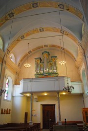 Vue de l'orgue dans son cadre de la tribune. Cliché personnel (juillet 2018)