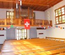 Vue intér. église réform. Oensingen (avec l'orgue). Source: https://www.ref-oensingen.ch/kirche