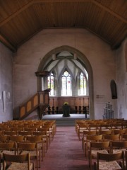 Vue de la nef de l'église depuis le dessous de la tribune de l'orgue. Cliché personnel